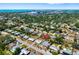 This aerial view pinpoints the property within a vibrant neighborhood, near the waterfront, showcasing its prime location at 2311 Sunnyside Pl, Sarasota, FL 34239