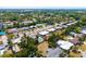 The location provides a picturesque view of the neighborhood, full of mature trees, and well kept landscaping at 2311 Sunnyside Pl, Sarasota, FL 34239