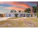 Charming single story home featuring a brick pathway and well-maintained landscaping at 2311 Sunnyside Pl, Sarasota, FL 34239