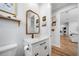 Charming powder room features modern vanity, white marble countertop, and stylish decor at 2366 Ann Arbor Rd, North Port, FL 34286