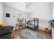 Bedroom featuring a bunkbed, desk, and laminate flooring at 2366 Ann Arbor Rd, North Port, FL 34286