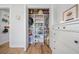 Open closet featuring shelving and a full wardrobe at 2366 Ann Arbor Rd, North Port, FL 34286