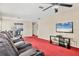 Comfortable living room with plush leather seating and open flow to the kitchen at 2715 52Nd Avenue W Ter, Bradenton, FL 34207