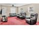 Inviting living room featuring plush seating and natural light filtering through the windows at 2715 52Nd Avenue W Ter, Bradenton, FL 34207