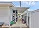Outdoor storage area featuring shelving, yard equipment, and various tools at 2715 52Nd Avenue W Ter, Bradenton, FL 34207