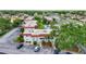 A charming community featuring a pristine pool, lush green landscaping, and ample parking at 3500 Beneva Rd # 306, Sarasota, FL 34232