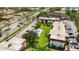 Aerial view of the community featuring mature landscaping and a refreshing pool at 3500 Beneva Rd # 306, Sarasota, FL 34232