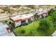 Aerial view of the condo complex with mature trees and lush lawns at 3500 Beneva Rd # 306, Sarasota, FL 34232