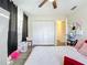 This bedroom features a built-in closet and a view of the hallway at 3500 Beneva Rd # 306, Sarasota, FL 34232
