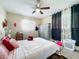 Comfortable bedroom with a ceiling fan, window and a closet for all your belongings at 3500 Beneva Rd # 306, Sarasota, FL 34232