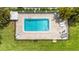 Aerial view of the pool with brick paver patio and lounge chairs at 3500 Beneva Rd # 306, Sarasota, FL 34232