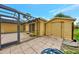Backyard with a pool, patio, and storage shed at 3530 Adelaide Ave, North Port, FL 34288