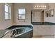 Bathroom featuring tub and vanity at 3530 Adelaide Ave, North Port, FL 34288