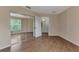 Bedroom features include hardwood floors, sliding closet door, and natural light at 3530 Adelaide Ave, North Port, FL 34288