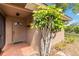 Inviting front entrance with a decorative door and lush landscaping at 3600 Aster Dr, Sarasota, FL 34233