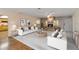 Bright living room featuring a fireplace, wood accents, and neutral décor at 3600 Aster Dr, Sarasota, FL 34233