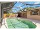 Inviting pool offers a screened enclosure with a tile surround and privacy at 3600 Aster Dr, Sarasota, FL 34233