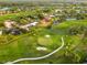 Golf course community with lush landscaping, serene water features, and well-maintained green spaces at 3941 Spyglass Hill Rd, Sarasota, FL 34238