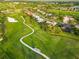 Aerial view of the golf course and surrounding community at 3941 Spyglass Hill Rd, Sarasota, FL 34238