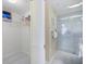 Bathroom with a closet and glass enclosed shower at 400 Laurel Lake Dr # 104, Venice, FL 34292