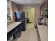 Practical community kitchen space featuring modern appliances and fixtures, offering residents a shared culinary area at 435 S Gulfstream Ave # 605, Sarasota, FL 34236