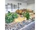 Indoor rock garden area featuring decorative rocks, plants, and a waterfall feature, adding a touch of nature at 435 S Gulfstream Ave # 605, Sarasota, FL 34236