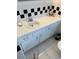 Bathroom vanity with white cabinets, round sink and classic chrome fixtures at 4502 3Rd Street W Cir # 242, Bradenton, FL 34207