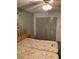 Bedroom featuring twin beds, ceiling fan, and ample closet space at 4502 3Rd Street W Cir # 242, Bradenton, FL 34207