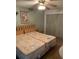 Bedroom featuring twin beds, ceiling fan, and ample closet space at 4502 3Rd Street W Cir # 242, Bradenton, FL 34207