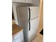Clean, white refrigerator and freezer with black handles in the kitchen area at 4502 3Rd Street W Cir # 242, Bradenton, FL 34207