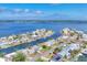 Aerial view of a waterfront property showing its location in a scenic coastal neighborhood with beautiful water views at 4911 Commonwealth Rd, Palmetto, FL 34221