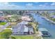 Aerial view of the property, highlighting the screened pool and canal access at 4911 Commonwealth Rd, Palmetto, FL 34221