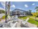 Backyard patio, pool, and screened enclosure, great for entertaining at 4911 Commonwealth Rd, Palmetto, FL 34221