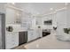 Kitchen features white cabinetry, stainless appliances and updated countertops at 4911 Commonwealth Rd, Palmetto, FL 34221