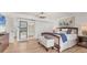 Comfortable main bedroom featuring an ensuite bathroom and closet at 4911 Commonwealth Rd, Palmetto, FL 34221