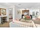 Cozy living area with a wet bar, comfortable seating, and an open view to the bedroom at 5055 Gulf Of Mexico Dr # 435, Longboat Key, FL 34228