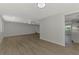 Bright, open living room with hardwood floors, recessed lighting, and modern color scheme at 510 S Venice Blvd, Venice, FL 34293