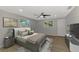 A well-lit main bedroom offers a ceiling fan and a calming color scheme at 510 S Venice Blvd, Venice, FL 34293