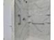 Shower with marble tile and chrome hardware at 510 S Venice Blvd, Venice, FL 34293