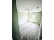 Sunlit bedroom with tile floors and ceiling fan at 5113 Rilke Ln, Port Charlotte, FL 33981
