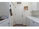 Practical laundry room with sink, washer, and dryer at 5603 90Th Avenue E Cir, Parrish, FL 34219