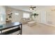Comfortable living room featuring neutral tones and ceiling fan at 5732 Beneva Rd, Sarasota, FL 34233