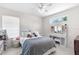 Bedroom featuring carpet flooring, a ceiling fan, and a vanity table in the corner at 5915 43Rd E Ct, Bradenton, FL 34203