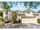 Charming two-story home with well-manicured landscaping and a two-car garage at 5915 43Rd E Ct, Bradenton, FL 34203
