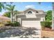 Charming two-story home with well-manicured landscaping and a two-car garage at 5915 43Rd E Ct, Bradenton, FL 34203