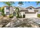 Charming two-story home with well-manicured landscaping and a two-car garage at 5915 43Rd E Ct, Bradenton, FL 34203