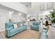 Spacious living room with high ceilings, featuring stylish decor and an open layout at 5915 43Rd E Ct, Bradenton, FL 34203