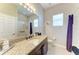 Bathroom with granite countertop, undermount sink and walk-in shower at 618 148Th Ne Ct, Bradenton, FL 34212