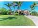 Charming one-story home showcasing a paver driveway and a meticulously maintained lawn at 618 148Th Ne Ct, Bradenton, FL 34212