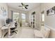 Spacious home office with ample natural light and a comfortable seating area at 618 148Th Ne Ct, Bradenton, FL 34212